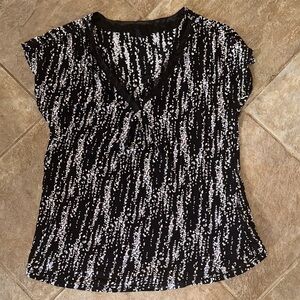Elegant Black and White Patterned Blouse